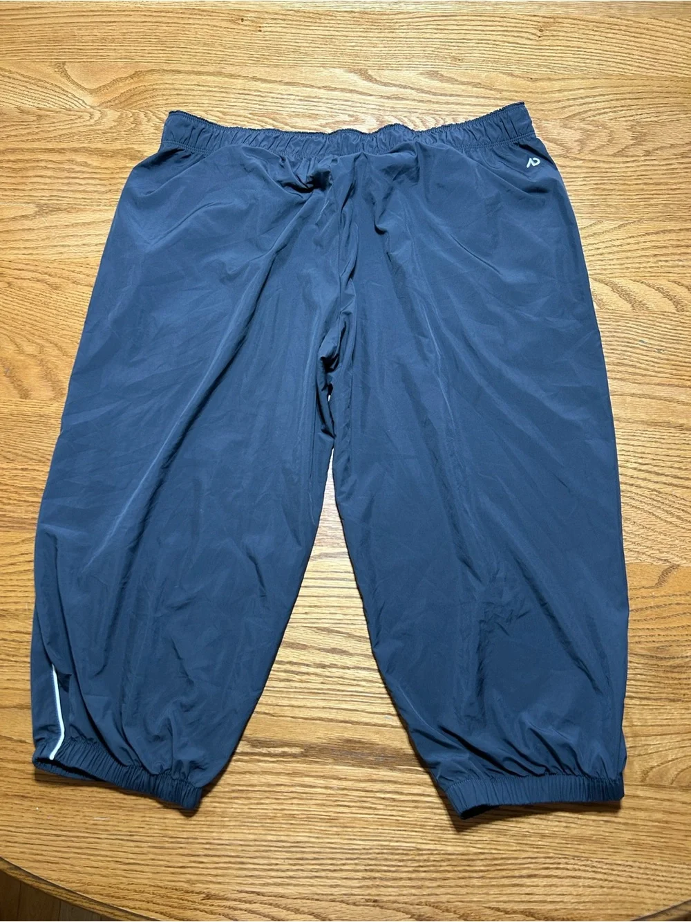 Women’s Nike the athletic dept Track Capris Grey with White Size XL